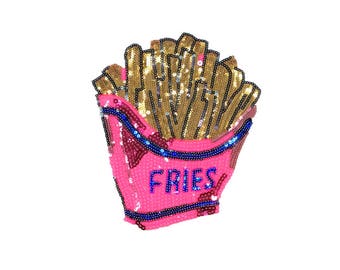 May include: A pink and gold sequined iron-on patch of french fries in a container with the word "FRIES" on the front.
