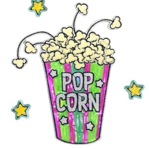 May include: A sequined popcorn patch with the words "POP CORN" in green. The popcorn container is green and pink striped. Several yellow and teal stars are scattered around the popcorn.