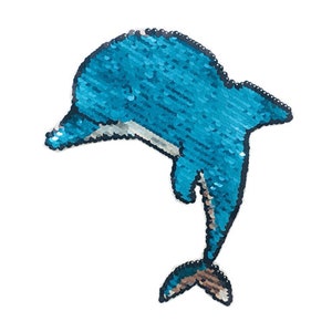 May include: A blue sequin dolphin patch with a white belly and a brown tail. The dolphin is jumping out of the water.