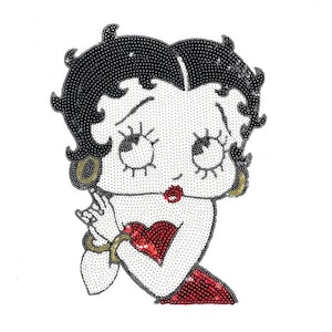 May include: A sequined Betty Boop patch. The cartoon character is depicted with black hair, large eyes, and red lips. She wears a red dress and gold hoop earrings. The patch is made of small, shiny sequins.
