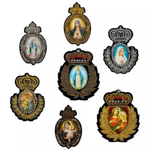 May include: Seven embroidered iron-on patches featuring images of the Virgin Mary and Jesus. The patches are decorated with gold and silver thread, rhinestones, and beads.