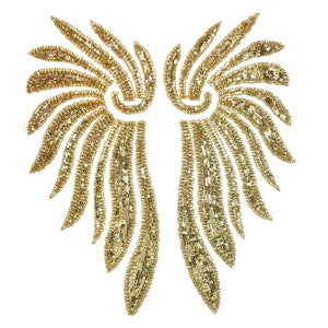May include: A pair of gold sequined wings, perfect for adding a touch of sparkle to any project.