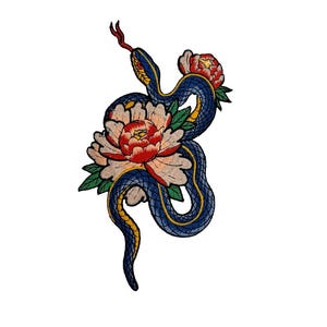 May include: An embroidered patch featuring a blue snake wrapped around a pink and white flower with red accents. The snake is curled around the flower and has a yellow stripe down its back.