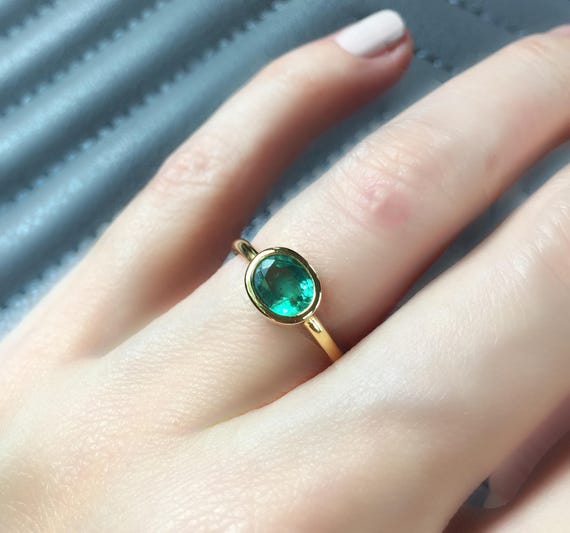 14k White or Yellow Gold Oval Bezel Set Emerald & Diamond Ring 14k White or Yellow Gold Oval Bezel Set Emerald & Diamond Ring