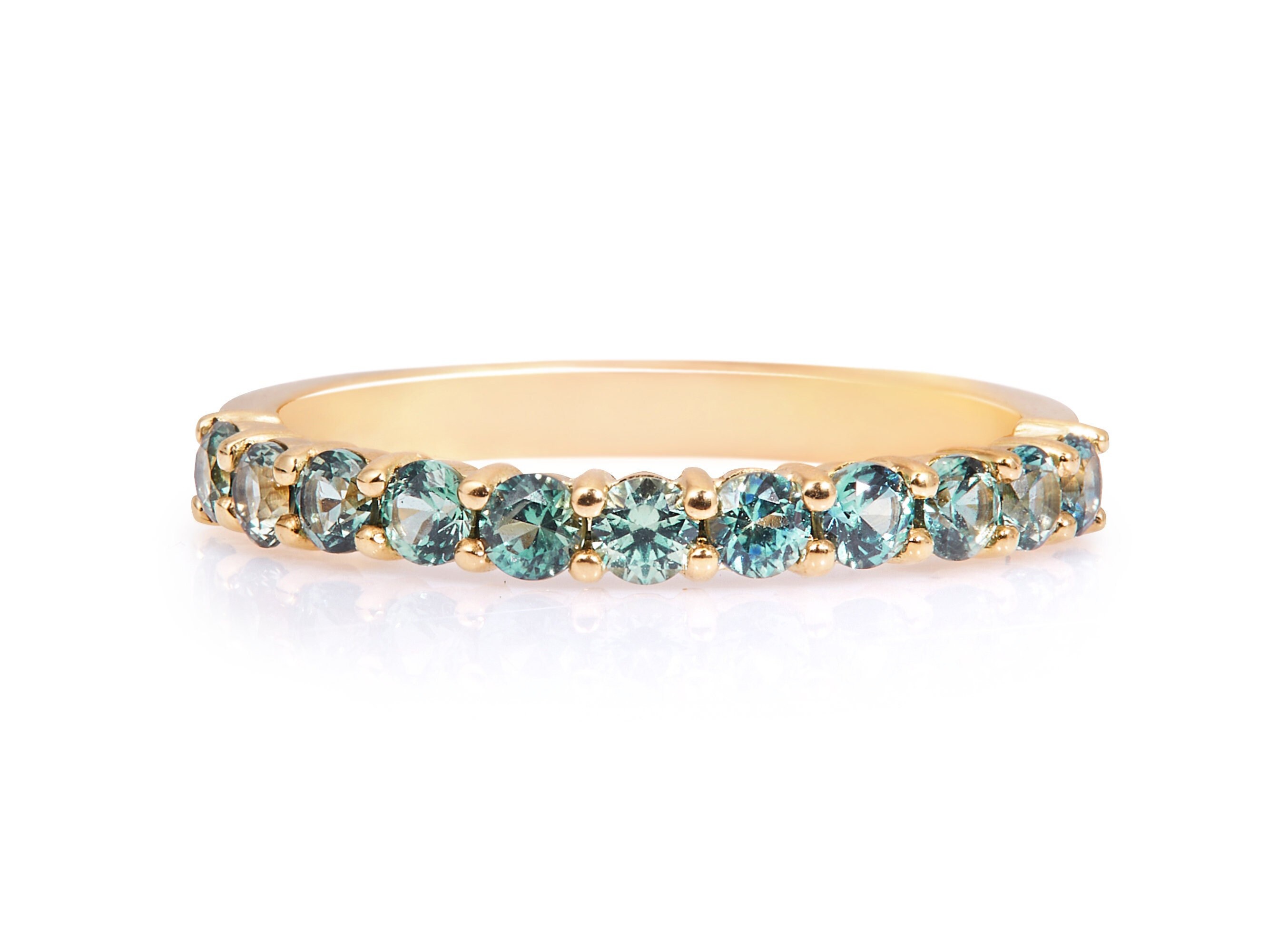 Teal sapphire eternity ring deals