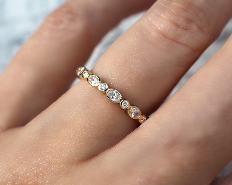 oval diamond eternity band