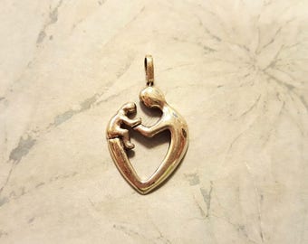 Vintage Marked 925 Sterling Silver Family Pendant,1 3/8" by 7/8",4 grms,silver,Not Scrap,mother or father and child,kids,heart shape
