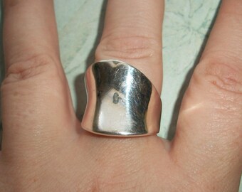 VINTAGE Marked 925 Sterling Silver Abstract Ring,8.4 grams,Size between 7.75,smooth band,not scrap,wide
