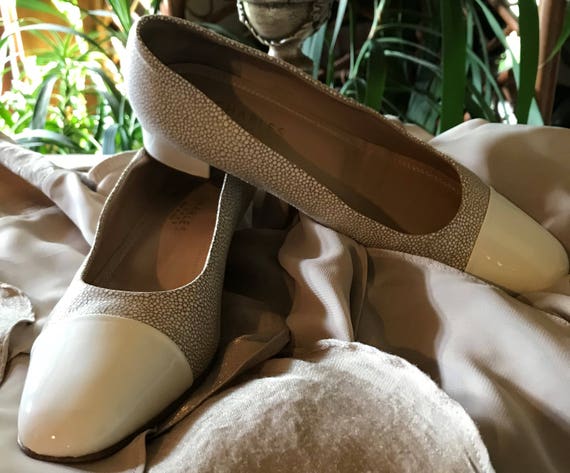 white leather court shoes