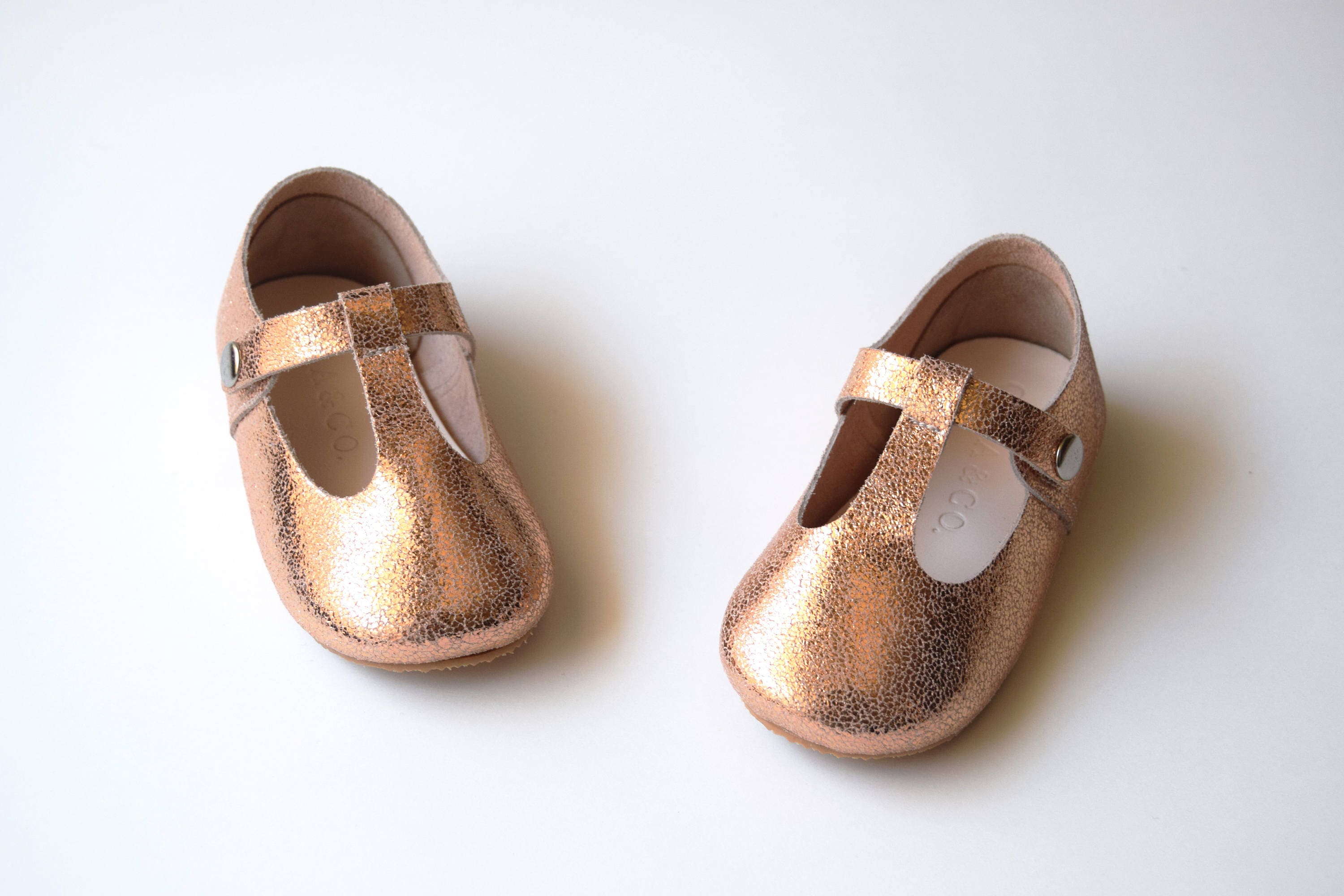 infant girl gold shoes