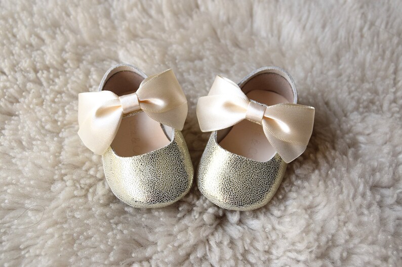 gold newborn shoes