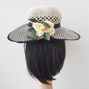 Cute vintage women&#39;s straw hat in beige and dark blue with yellow flower. Size XS