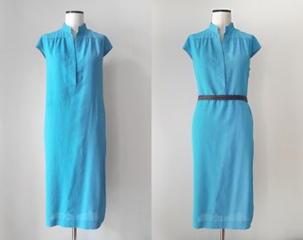 Robe chemise cool turquoise des années 70 par Fink Modell. Taille L/42 (EU)