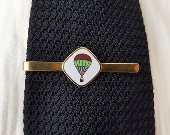 Vintage tie clip with balloon motif