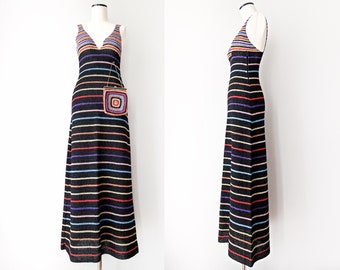 Sexy 1970s crochet dress in black with colorful stripes and matching bag. Size S