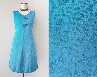 1960 Twiggy robe turquoise avec lurex par Peter Barron Londres
