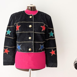 Blouson en cuir suédé Dino'z noir des années 1980 avec étoiles colorées et garniture dorée M / L