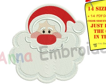 Puede incluir: Un rostro bordado de Papá Noel con gorro y nariz rojos, y barba blanca. Una nota adhesiva amarilla con texto sobre tamaños y directrices de diseño está fijada en la imagen. El logotipo de Anna Embroidery es visible.