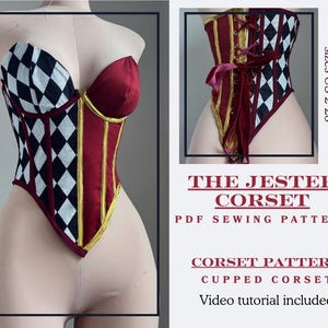 May include: A corset with a harlequin pattern and red and gold panels. The corset is displayed on a mannequin. The image includes the text "THE JESTER CORSET PDF SEWING PATTERN". Sizes US 2-28 are available. Video tutorial included.