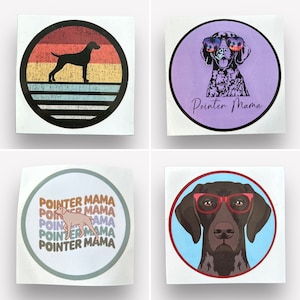 May include: Four different sticker designs featuring a German Shorthaired Pointer dog. The first sticker has a retro-style design with a black silhouette of the dog on a striped background. The second sticker has a purple background with a cartoon image of the dog wearing sunglasses. The third sticker has a light blue background with a cartoon image of the dog wearing sunglasses. The fourth sticker has a white background with a cartoon image of the dog wearing sunglasses and the text "Pointer Mama" repeated four times.