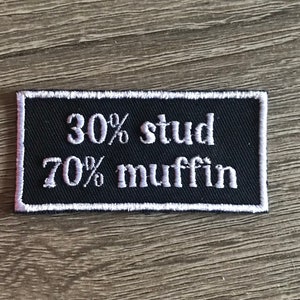 May include: Black embroidered patch with white text that reads "30% stud 70% muffin".