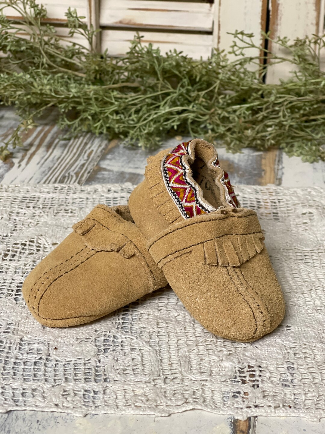 minnetonka baby moccasins rose gold