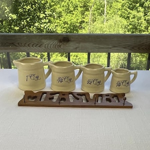 Vintage Set Of Wall Hanging Measuring Cups ~ Beige Stoneware With Blue Lettering Measuring Cup Set ~ Wood &quot;Measure&quot; Wall Mount ~ Taiwan