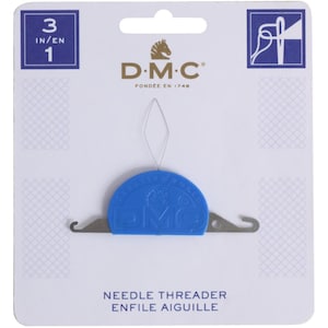 May include: A blue plastic needle threader with a metal hook and a loop for threading needles. The threader has the DMC logo and the text "Creative World" on it. The packaging says "3 in/en 1" and "Needle Threader Enfile Aiguille".