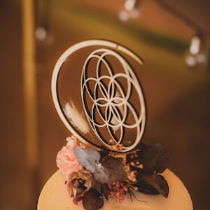 Sacred geometry wedding cake topper