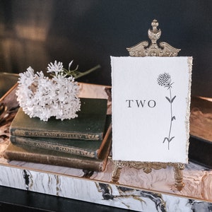 Torn edge wedding table number/name
