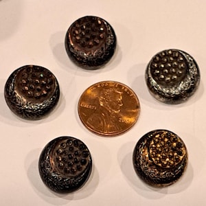 Czech black glass moon buttons. Red, silver, and gold luster.  Each sold separately.