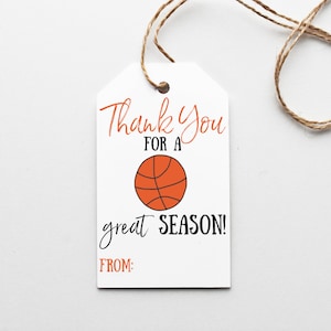 May include: White gift tag with orange text that says "Thank You for a great SEASON!" with a basketball graphic and the words "FROM:" at the bottom.