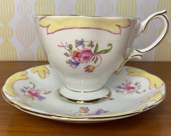 Tasse à thé et soucoupe en porcelaine de Chine Royal Albert Crown, tasse à thé et soucoupe à fleurs jaunes et roses, 1927 - 1935