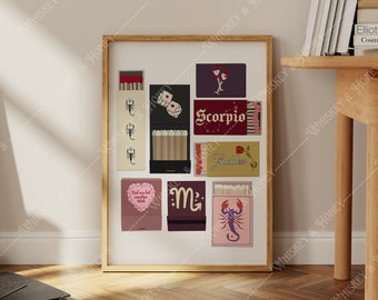 May include: A framed print with a collage of matchbox labels. The labels feature various designs, including dice, a scorpion, a heart, and a letter "M".