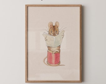 May include: A framed print featuring a watercolor illustration of a mouse reading a newspaper while perched on a red spool of thread. The words "Physical Print" are at the top, and "Whiskey and Honey" is at the bottom.