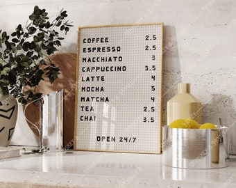 May include: A white sign with a gold frame lists coffee and tea drinks with prices. The sign says "OPEN 24/7".