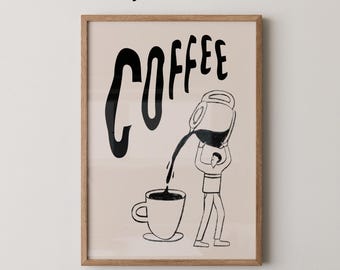 May include: A framed art print with the word "COFFEE" in large, black, stylized letters. The image depicts a person pouring coffee into a cup. The words "Physical Print" and "Whiskey and Honey" are also present.