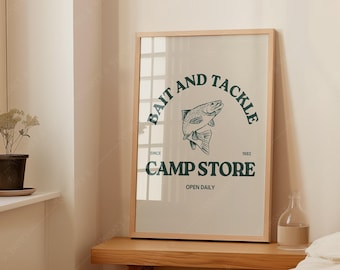 May include: A framed print with a green and white design. The print says "Bait and Tackle Camp Store" with a fish illustration and the years "Since 1982".