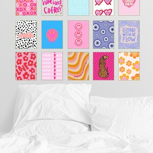 May include: A collection of 12 colorful wall prints with various designs and text. The prints feature phrases like "Good Vibes", "Self Care", and "Going With The Flow".