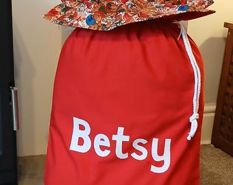Personalised Red Santa Sack in Traditional Christmas Red with a ruffle of TEDDIES at Play *