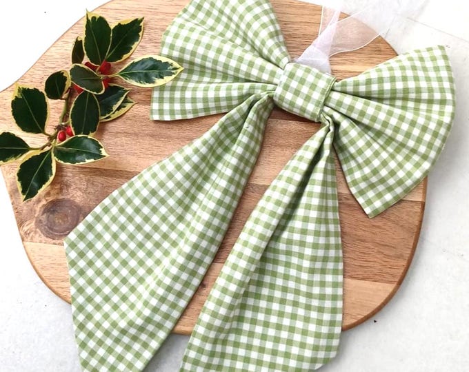 Green gingham fabric hanging bow for Christmas seasonal décor