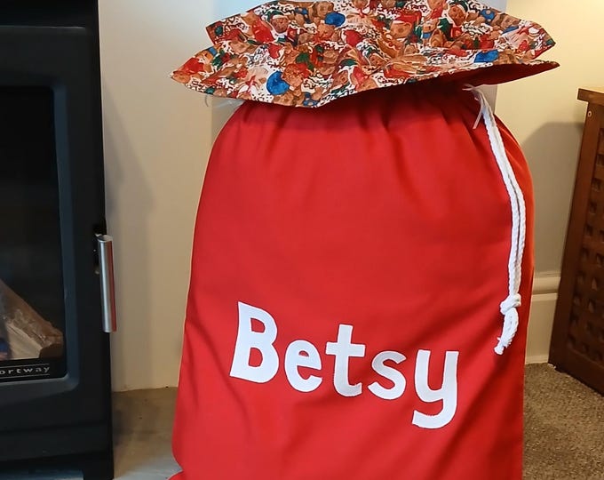 Personalised Red Santa Sack in Traditional Christmas Red with a ruffle of TEDDIES at Play *