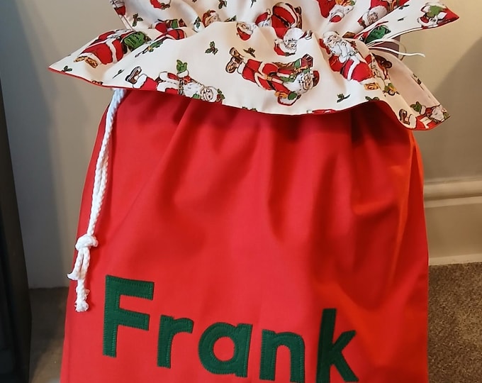 Personalised Santa Sack in Traditional Christmas Red with a ruffle of Santa on Cream *