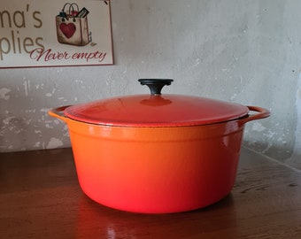 Zeer grote oranje Cousances made in France pan met deksel, maat 26
