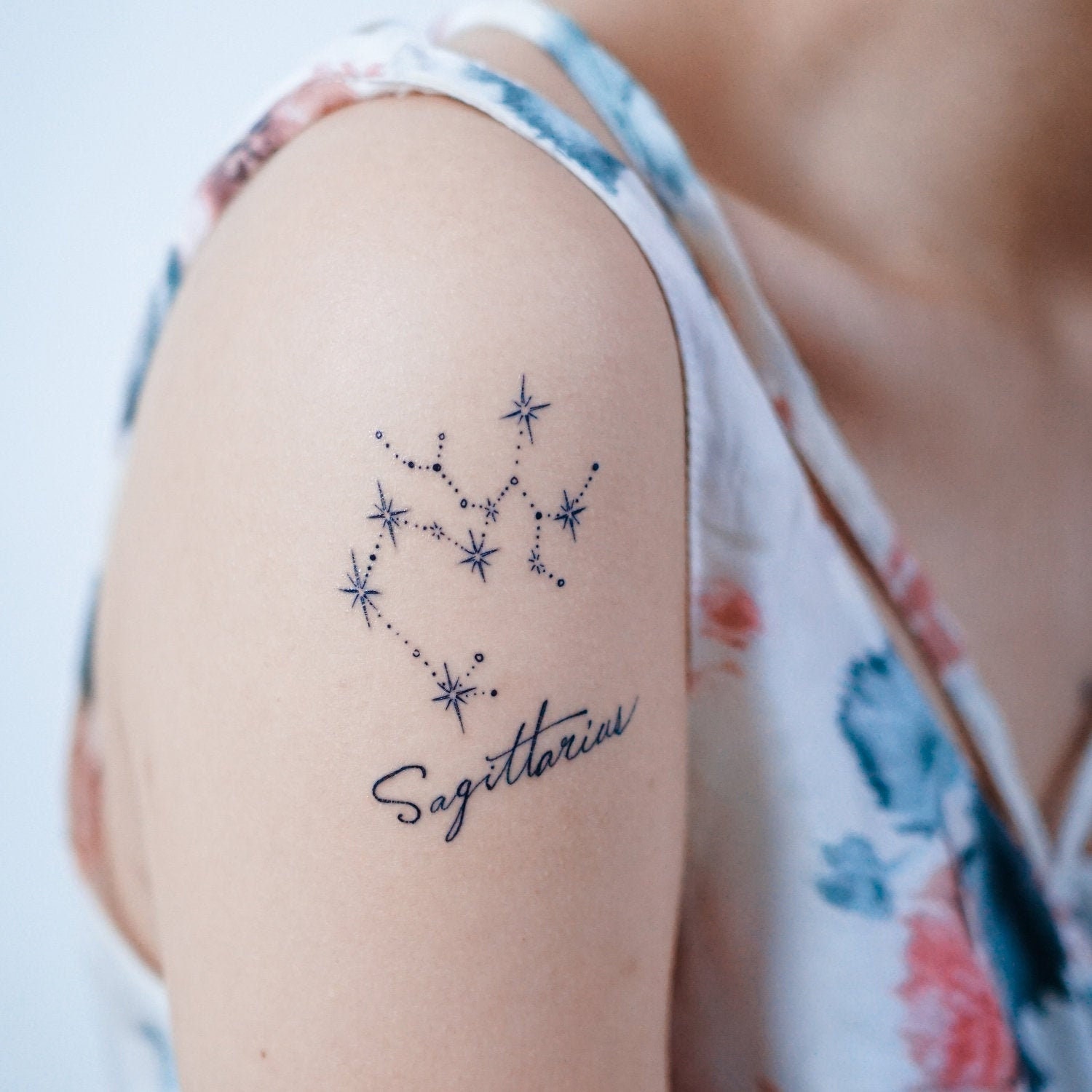 Minimalist Sagittarius Star Constellation Tattoo.