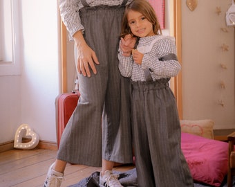 Girl romantic culotte pants with elastic belt and suspenders. 100% pinstripe wool.  Gray or dark blue.