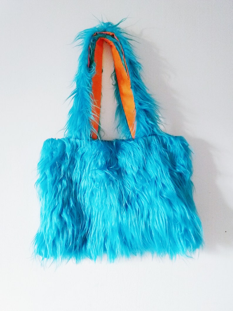 blue faux fur bag