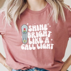 Shine Bright Like a Call Light Medical Shirt, ICU Nurse Gift, Future Emergency Nurse Tee, Funny Patient Care Tech Shirt for Hospital image 7