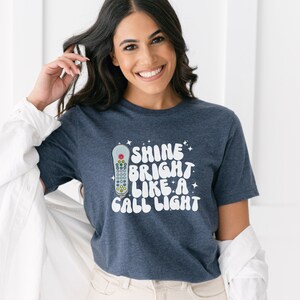 Shine Bright Like a Call Light Medical Shirt, ICU Nurse Gift, Future Emergency Nurse Tee, Funny Patient Care Tech Shirt for Hospital image 4