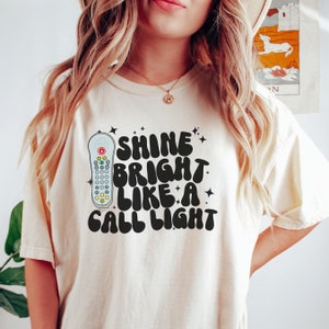 Shine Bright Like a Call Light Medical Shirt, ICU Nurse Gift, Future Emergency Nurse Tee, Funny Patient Care Tech Shirt for Hospital image 1